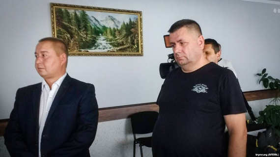 Задержанный Олег Кизименко в зале Херсонского городского суда
